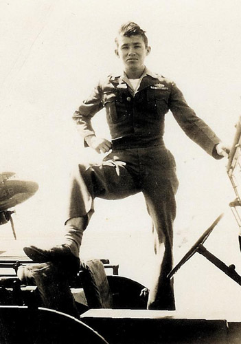 Hay Baber and jeep on the tarmac beside his B17 in WWII